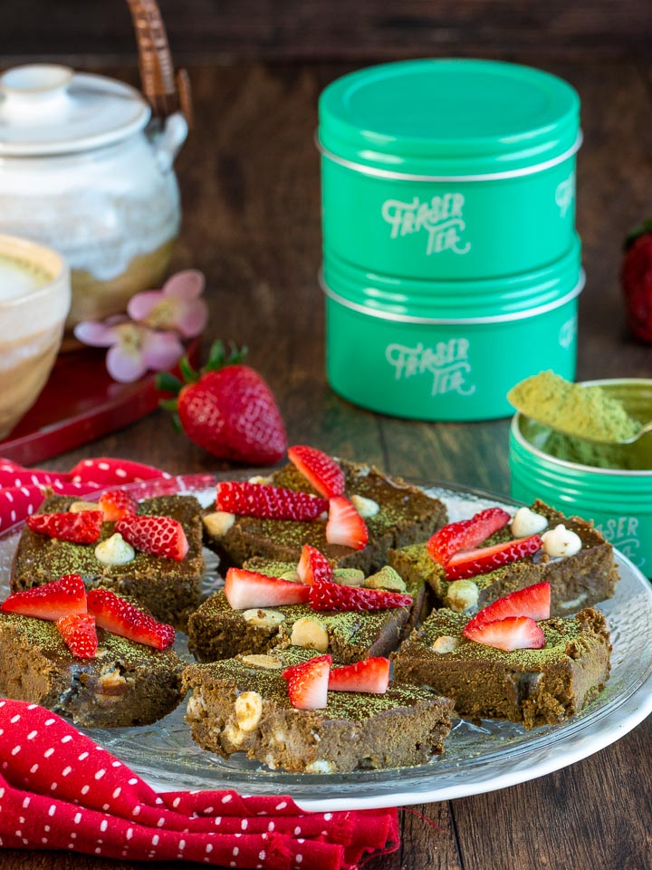 Matcha brownies with Fraser Matcha tea canisters with a little matcha latte. 