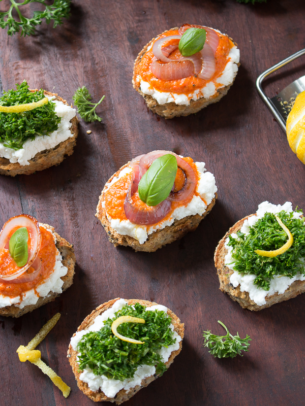 6 crostini ready to be served on a cherry wooden serving board. 
