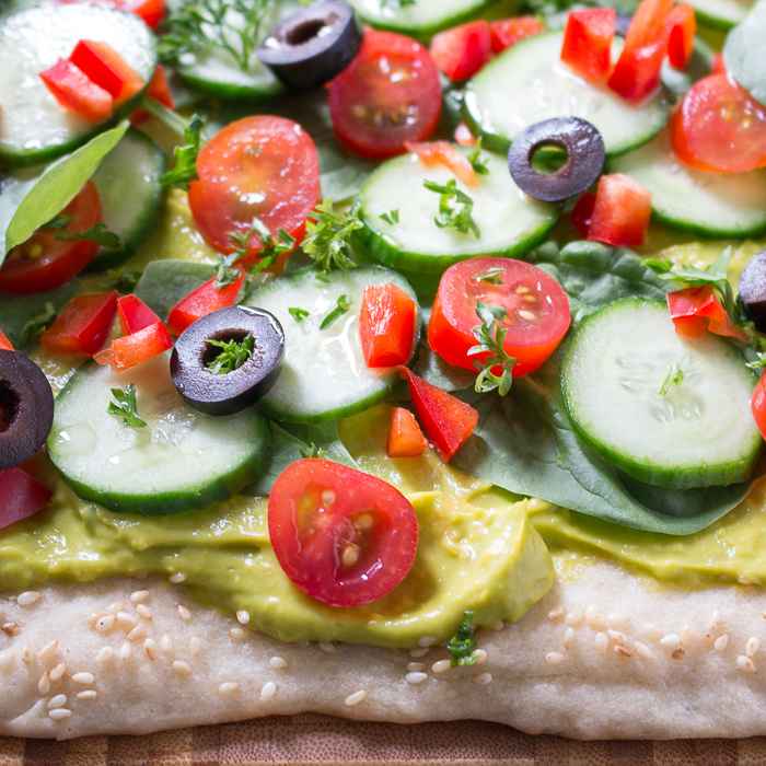 Super fresh toppings like fresh cucumbers, tomatoes, parsley, spinach and black olives.