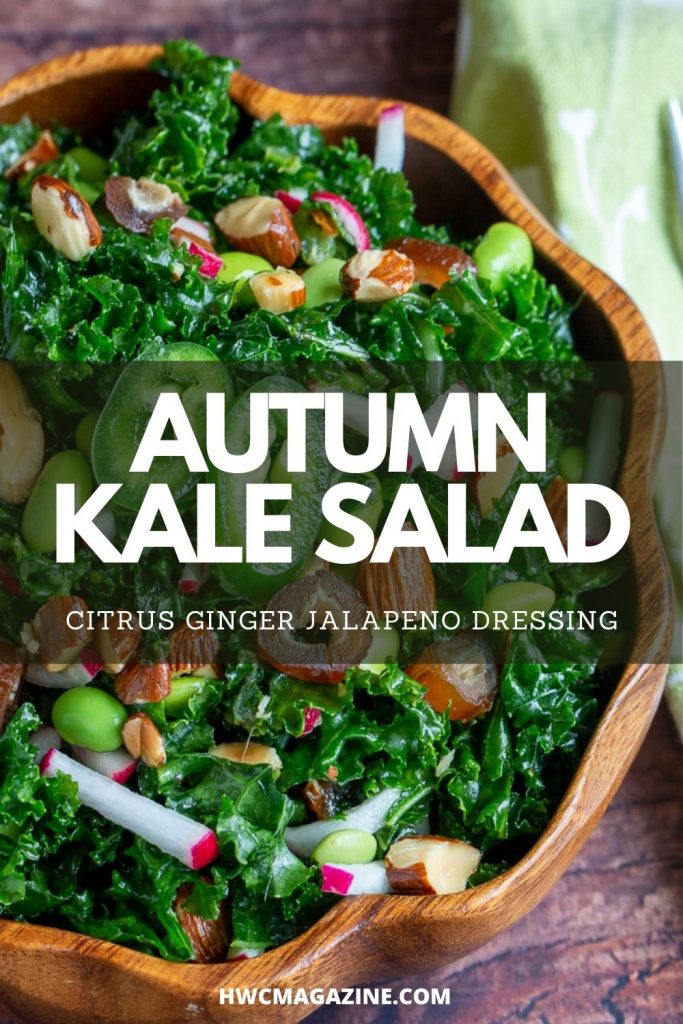 Fall Salad with kale, dates, almonds and veggies in a wooden bowl.