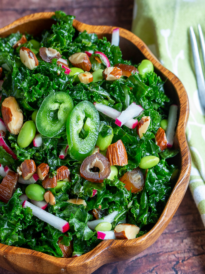 Close up of the salad showing all the dates, almonds, crunchy vegetables.