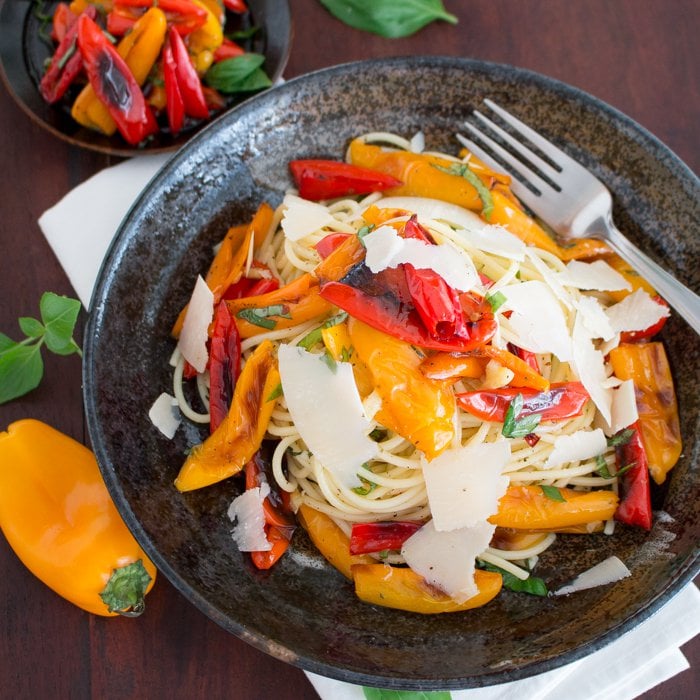 Pasta with shredded curls of parmesan.