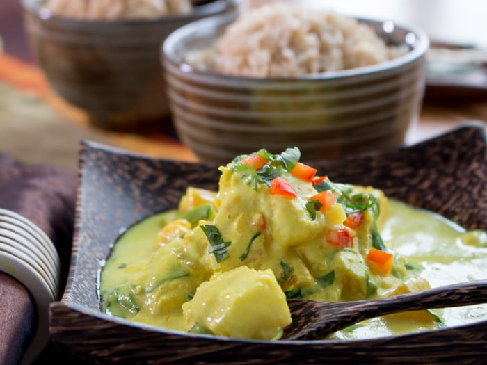 Fish curry served with brown rice. 