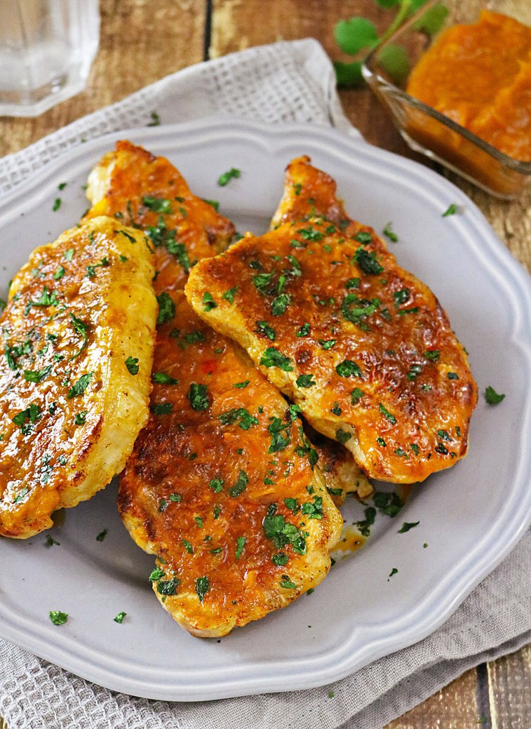 Curried Mango Pork Chops / https://www.hwcmagazine.com