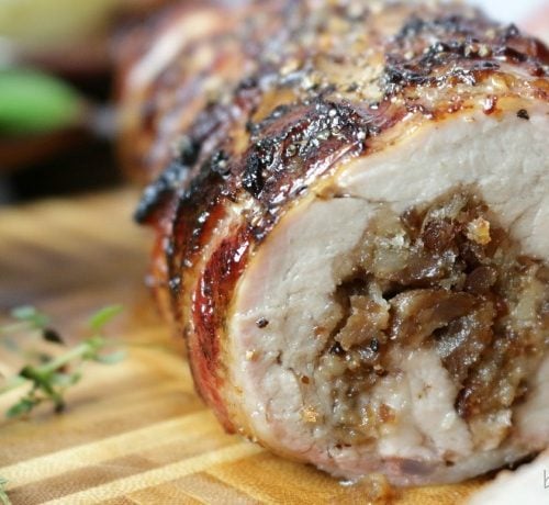 Bacon wrapped sausage stuffed pork tenderloin.