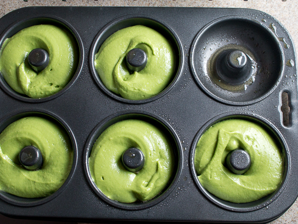 Baked Matcha Lemon Glazed Donuts ready to bake in the baking tin.