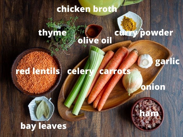 Ingredients to make the soup laid out on a wooden board.