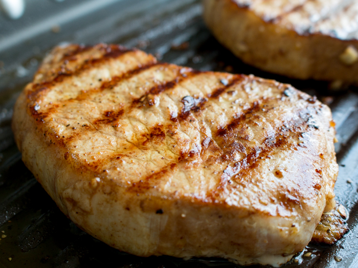 Grilled Five Spice Pork Loin Chops with Cherry Ginger Salsa / https://www.hwcmagazine.com