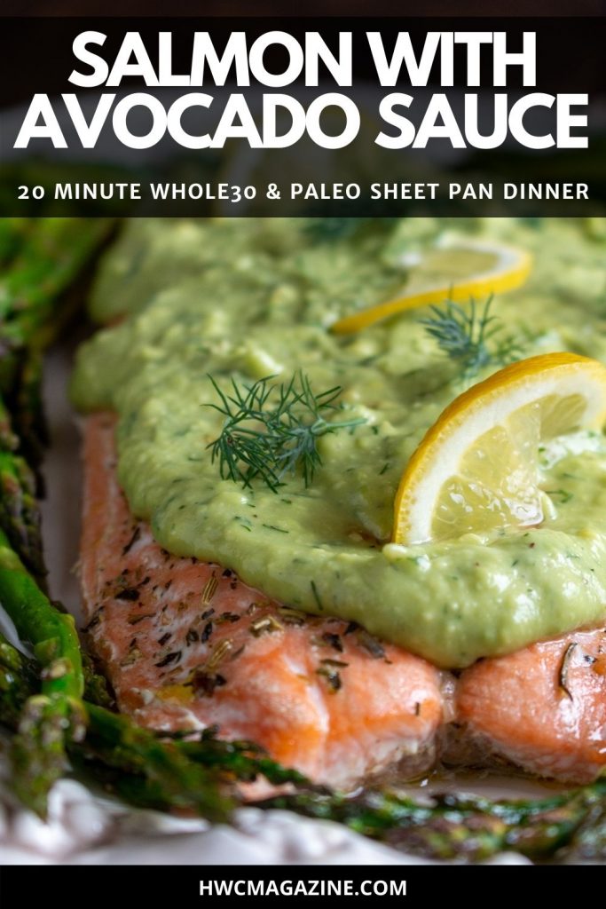 Close up shot of creamy dill avocado sauce slathered over a cooked salmon fillet.