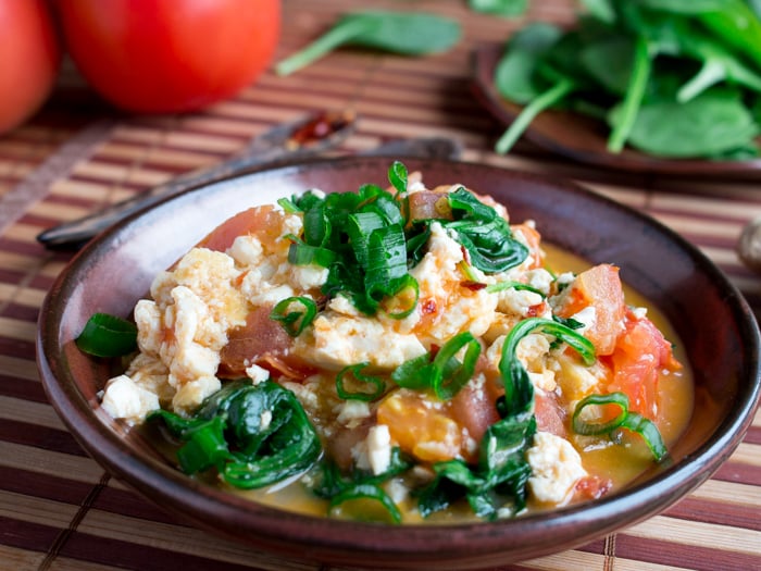 Close up shot to show the delicious juices of the tomato broth in this tofu scramble. 