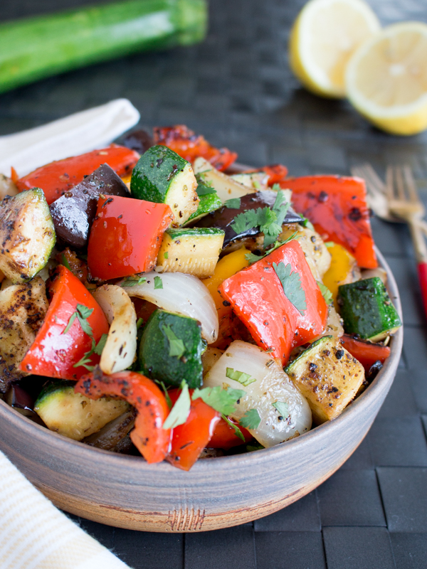 Close up shot of garden grilled vegetables garnished with parsley.