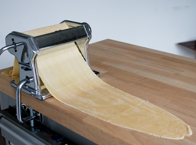 Pasta through the marcato pasta maker.