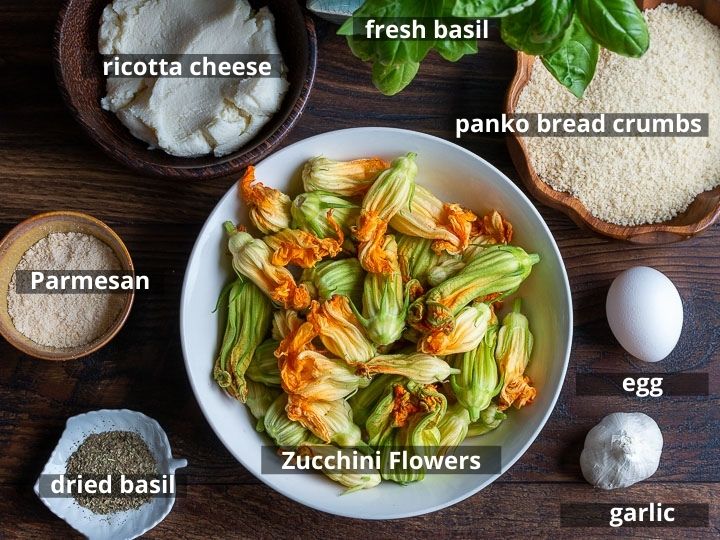 Ingredients all laid out on a dark cutting board.