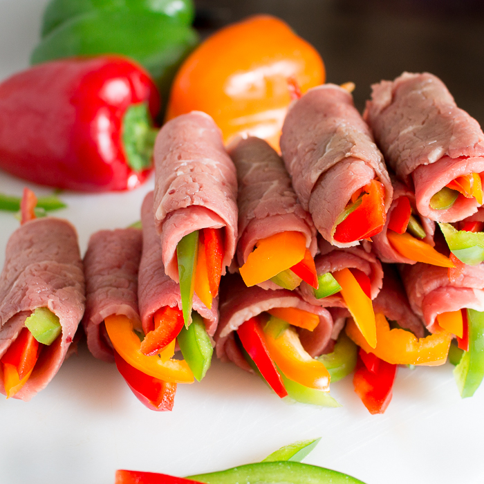 16 beef rollups ready to be cooked