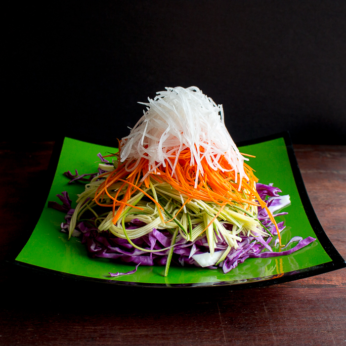 Layered high salad with out sesame seeds and dressing