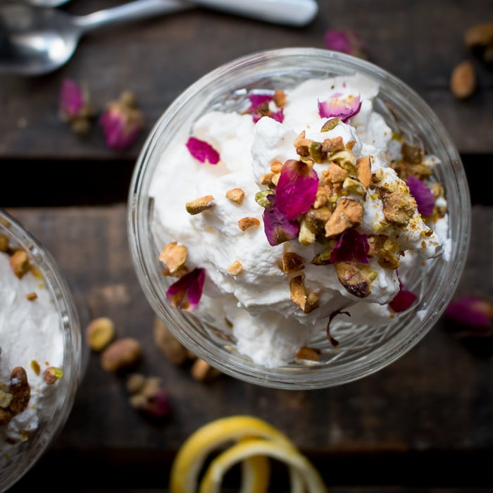 Top Down Photo of our lemon cream cheese mousse filling with crunchy nuts are rose petals.