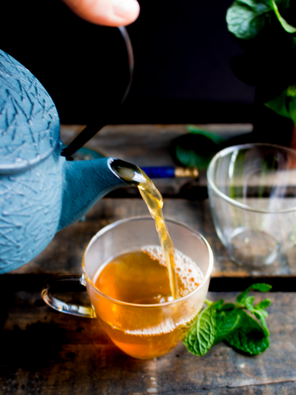 Hot Moroccan Mint Tea getting poured into cups