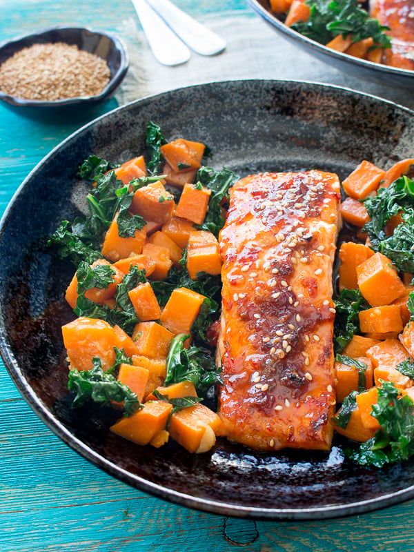 Baked Spicy Salmon and Sweet Potato Kale Hash / https://www.hwcmagazine.com