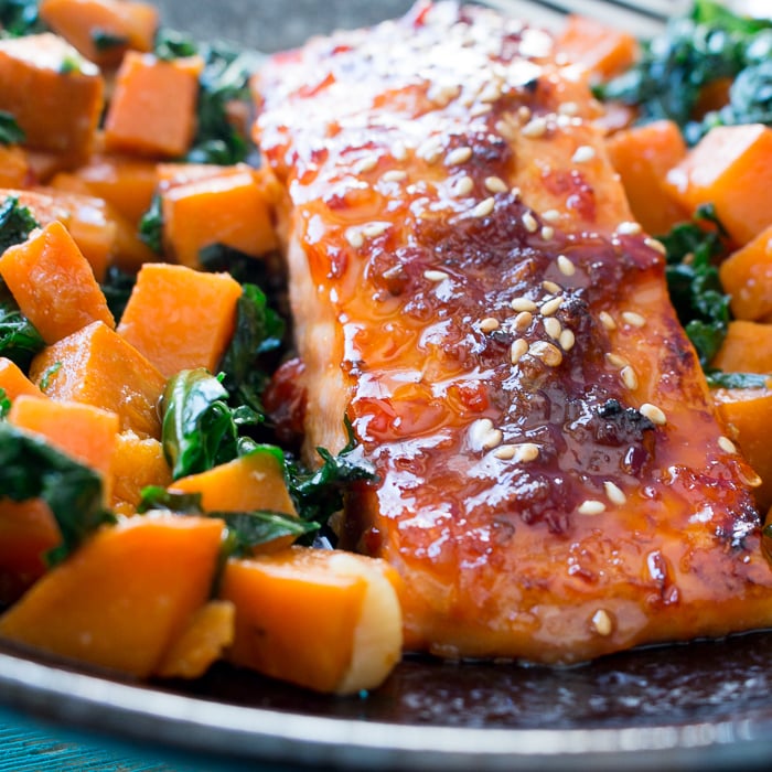 Baked Spicy Salmon and Sweet Potato Kale Hash / https://www.hwcmagazine.com