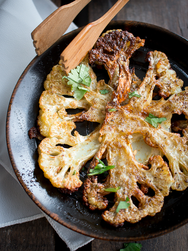 showing the crispy ends to the roasted root vegetable and topped with parsley. 
