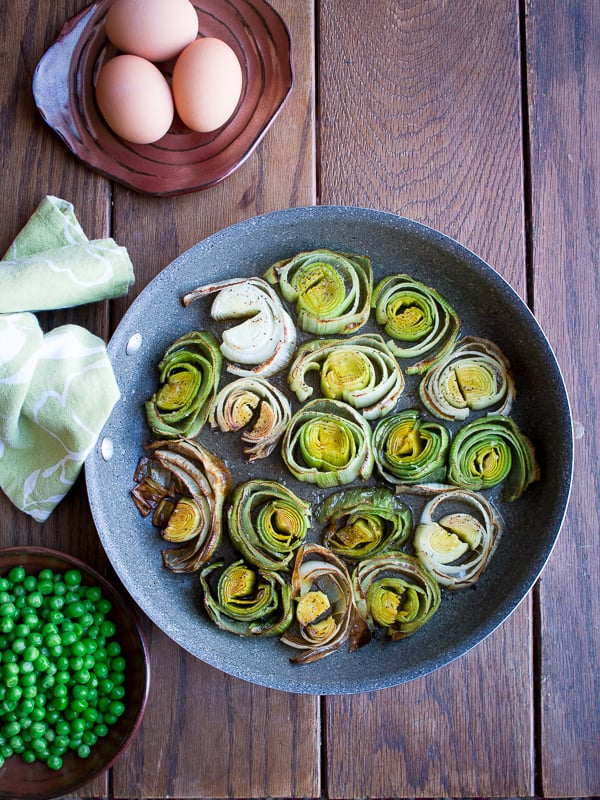 Grilled leek in a pan.