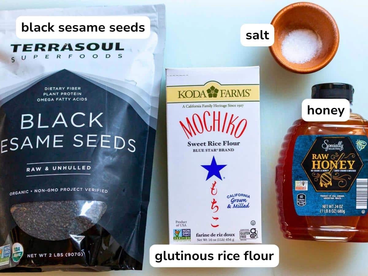 Ingredients to make Chinese Black Sesame soup on a white cutting board.