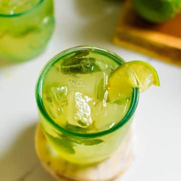 Coconut water mocktail garnished with citrus.