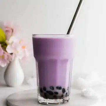Purple taro milk tea with boba balls.
