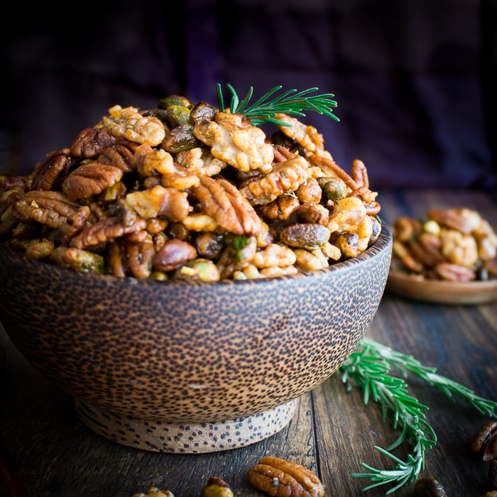 Stove Top Rosemary Party Nuts in a wooden bowl.