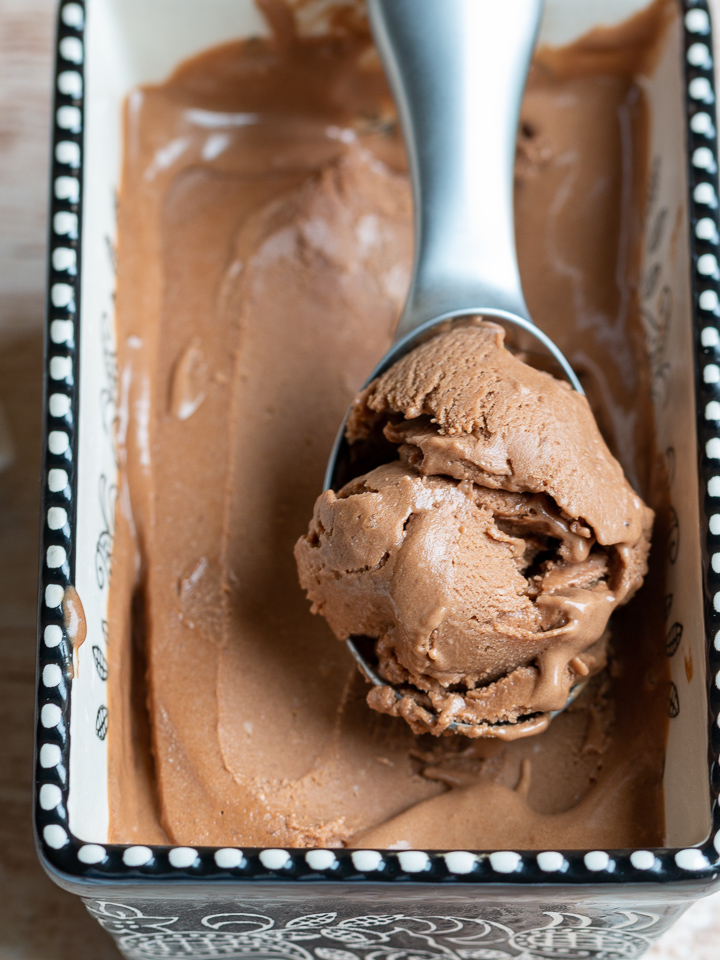 Close up shot of nice cream in an ice cream scoop.