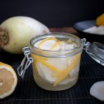 Lemon Daikon Radish Refrigerator Pickles in a glass jar.