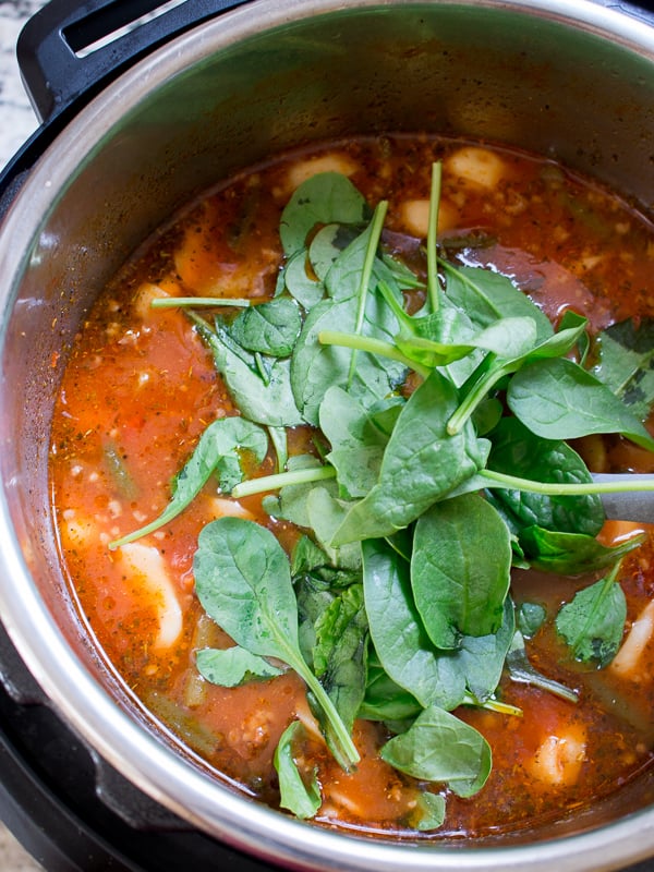 Spinach added to the soup after it finished cooking.