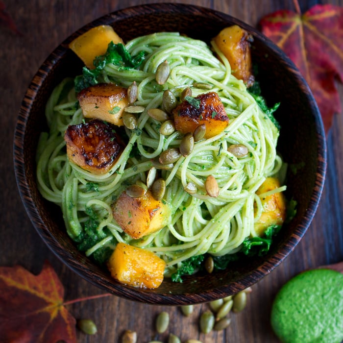 One Pot Creamy Kale Pesto Pasta  topped with roasted pepitas.