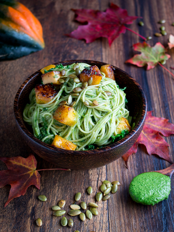 Wooden Bowl with One Pot Creamy Kale Pesto Pasta ready to eat.