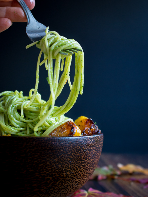 Spoonful of pasta with kale pesto.