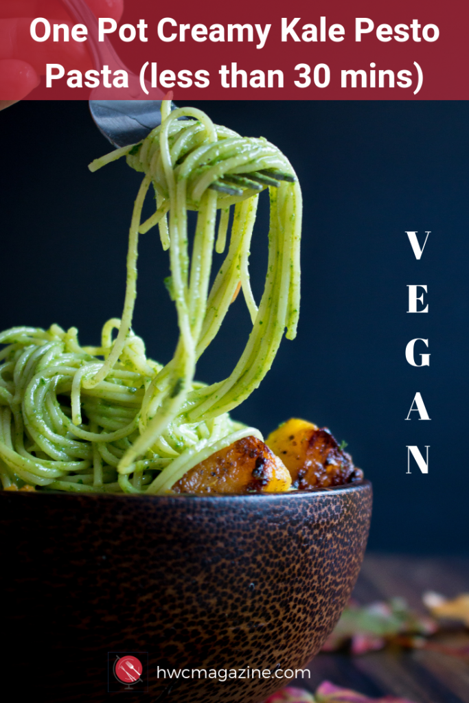 One Pot Creamy Kale Pesto Pasta is an easy way to get dinner on your table in under 30 minutes. Angel hair pasta noodles are tossed with a kale pepitas pesto and pan fried acorn squash. Everything is cooked in one pot! #pasta #noodleswithoutborders #pesto #kale #acorn #squash #vegan #easy #falldinneridea/ https://www.hwcmagazine.com
