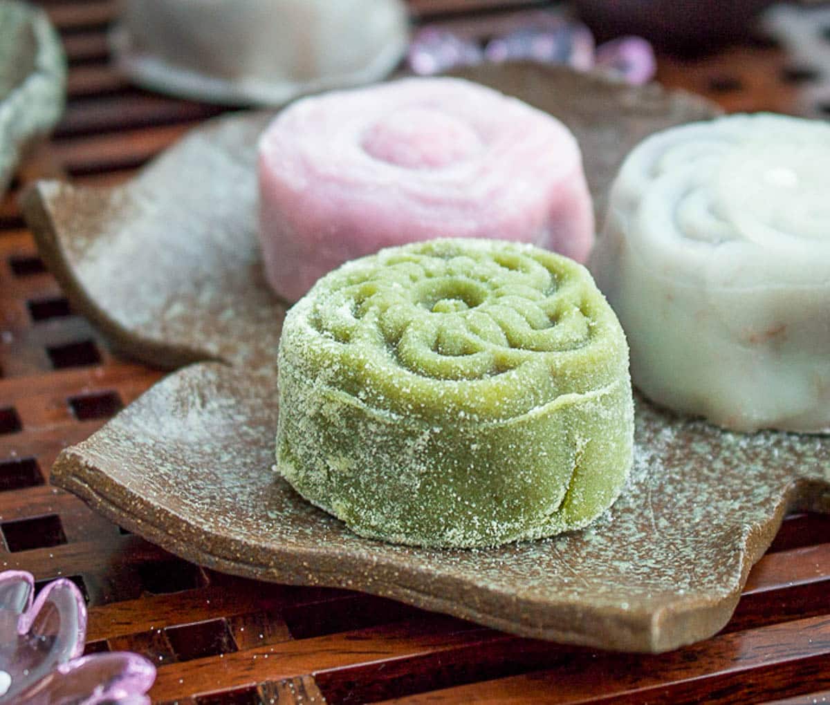 Showing the intricate design the mooncake stamp left on the homemade snowy mooncake. 