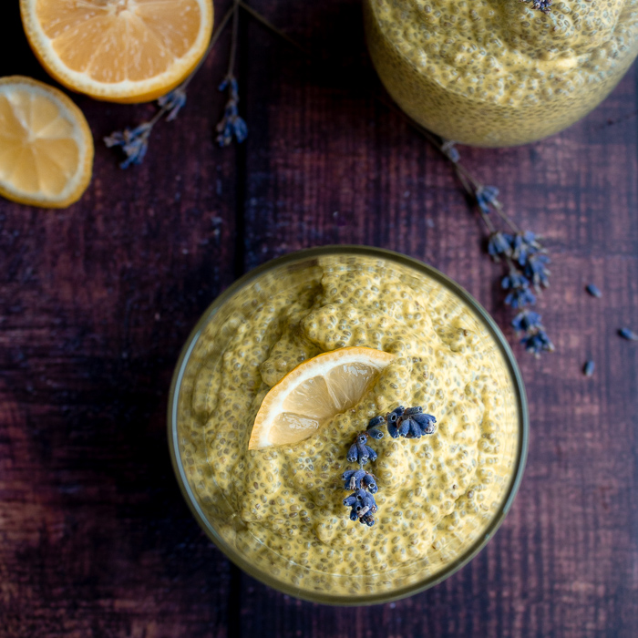 Top Down shot showing the chia seed pudding garnished with lemons and lavender sprigs.