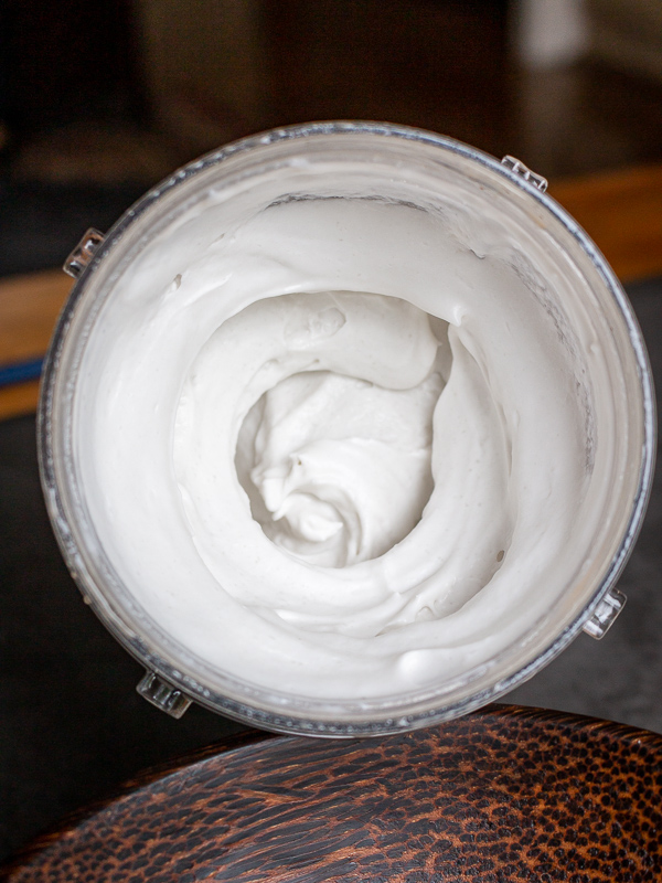 Overhead shot showing the blended coconut whiiped cream in the food processor.