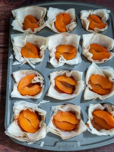 Mini Apricot Tarts in the cupcake pan ready to bake.
