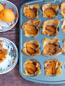 Apricot tarts just out of the oven cooling.