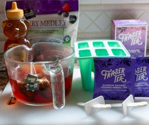 Tea steeping and all the ingredients on the table.