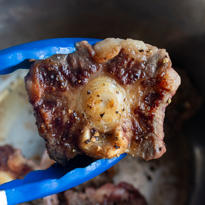 Seared and browned beef oxtail.