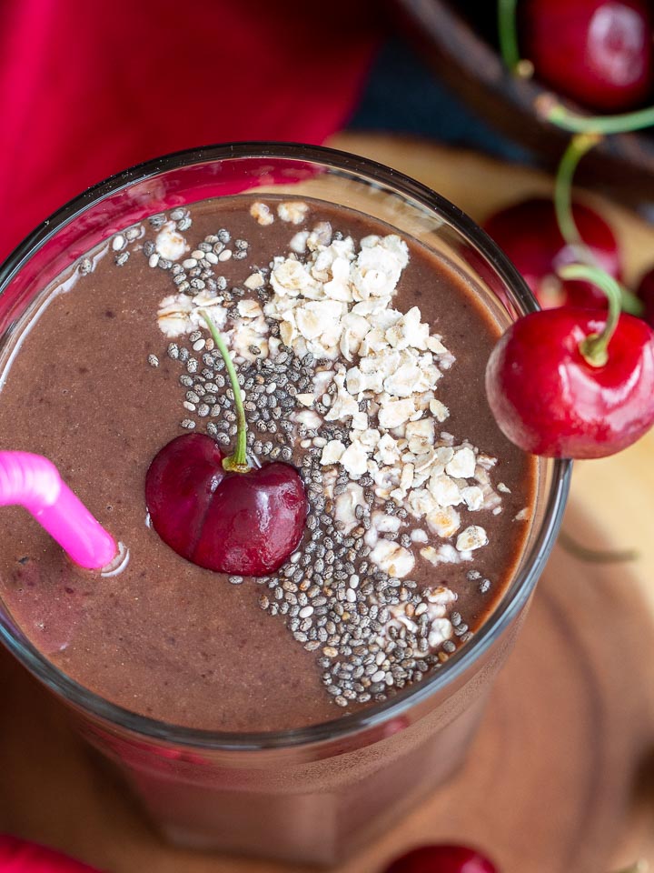 Up close shot of smoothie with all the garnishes on top.