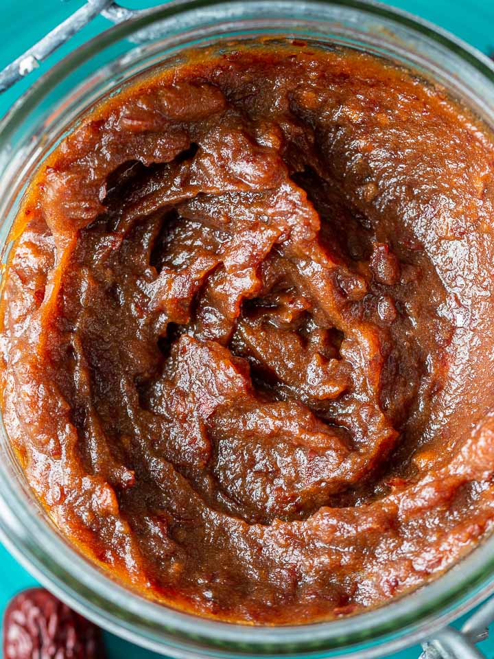 Jujube paste in a glass canning container.