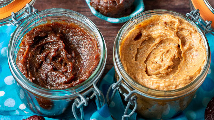 Jujube paste and medjool paste side by side showing red dates are darker than medjool paste.