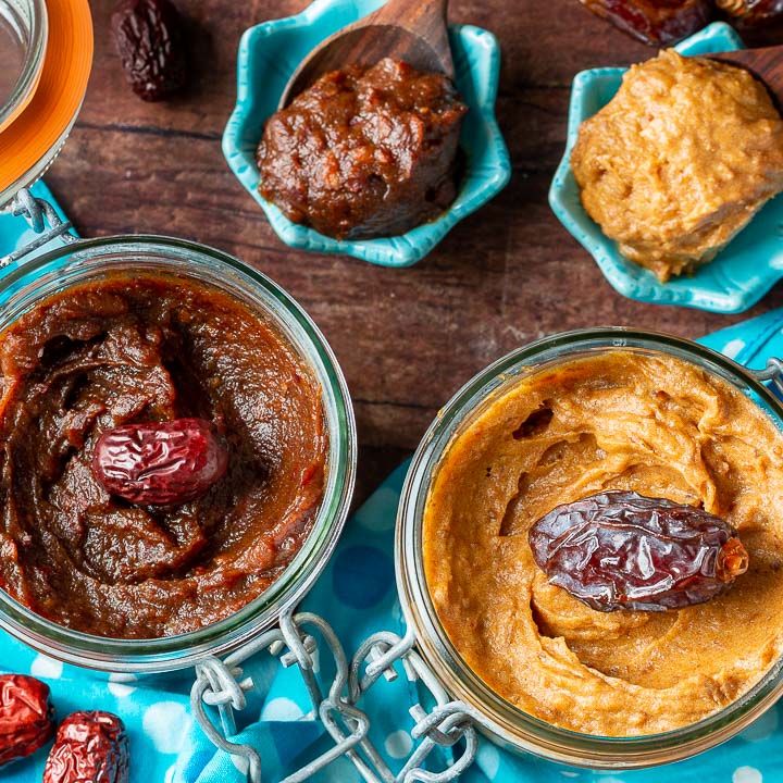 Jujube paste and Medjool Date paste in clear canning jars on a blue napkin.