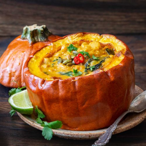 Thai pumpkin curry in a whole roasted pumpkin.