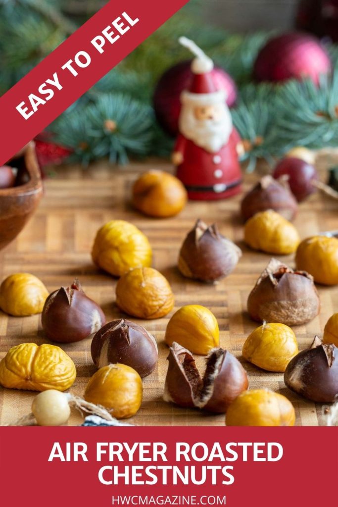Easy to Peel Air Fryer Chestnuts with some peeled and some not on a cutting board with holiday decorations.