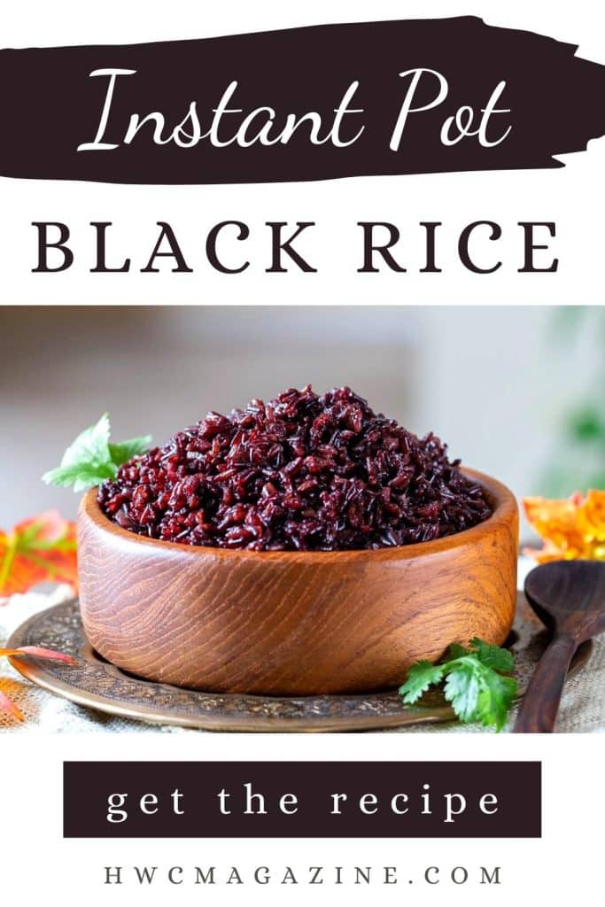 Hot Forbidden rice pilaf in a wooden bowl ready to be served.